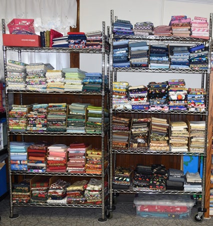 Racks of folded fabric